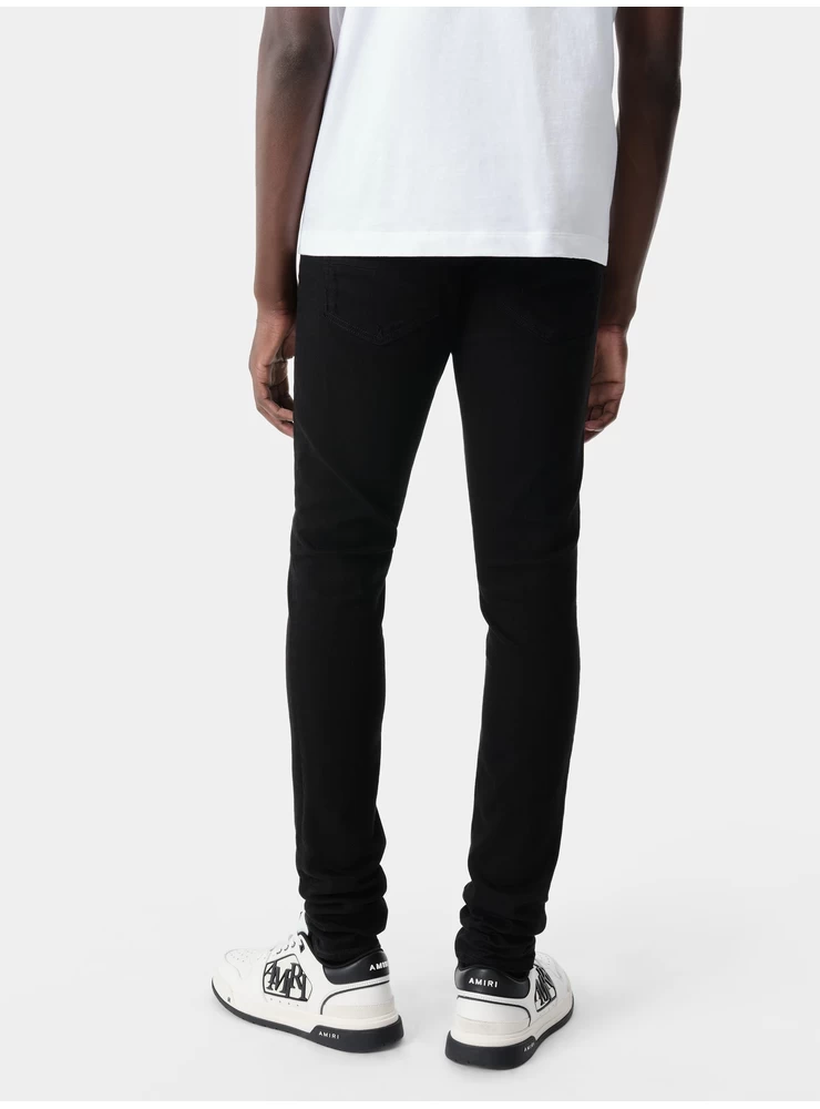 Amiri Stack Jeans – Schwarz