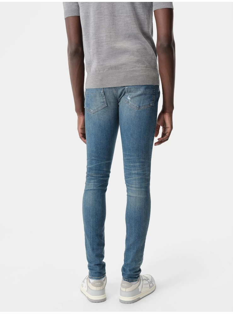 アミリ スタック ジーンズ - ダークインディゴ