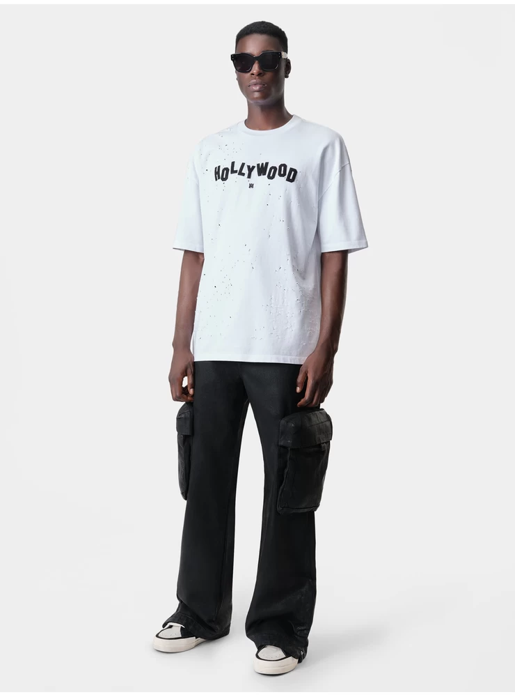 Camiseta Extragrande Amiri Hollywood Shotgun - Blanco