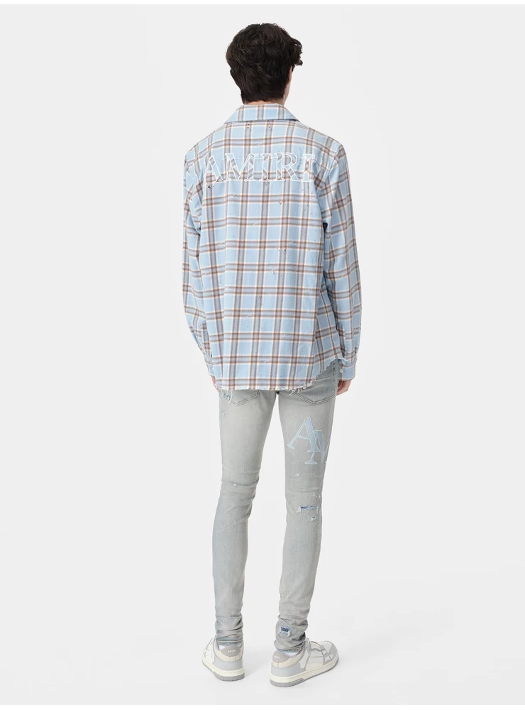 Amiri STAGGERED LOGO JEAN - Clay Indigo