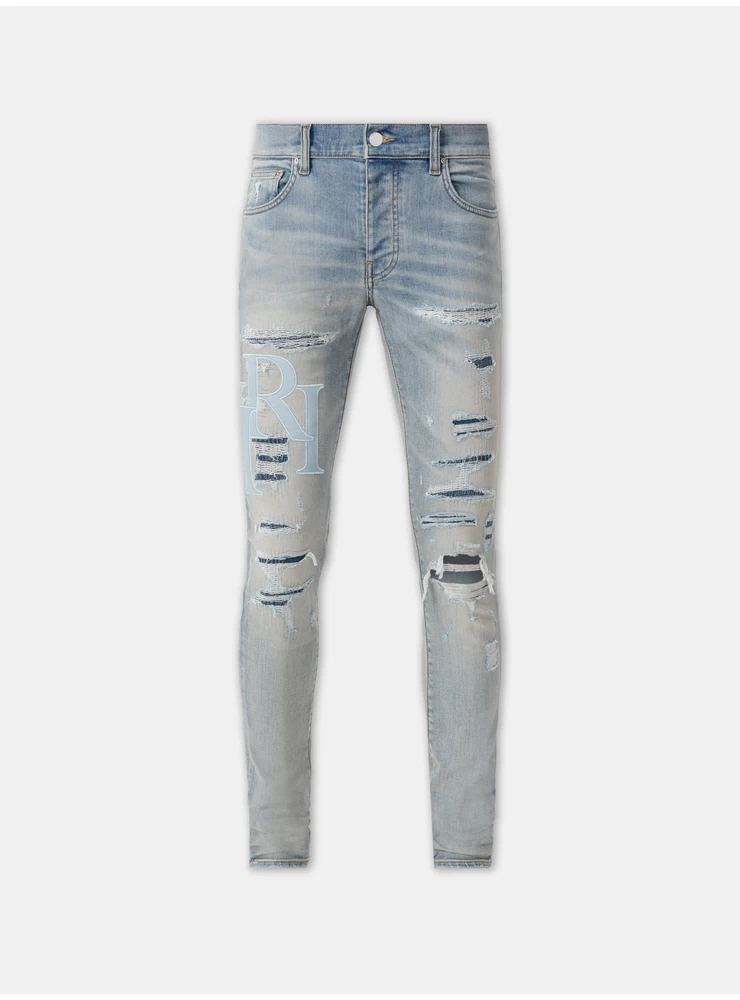 Amiri STAGGERED LOGO JEAN - Clay Indigo