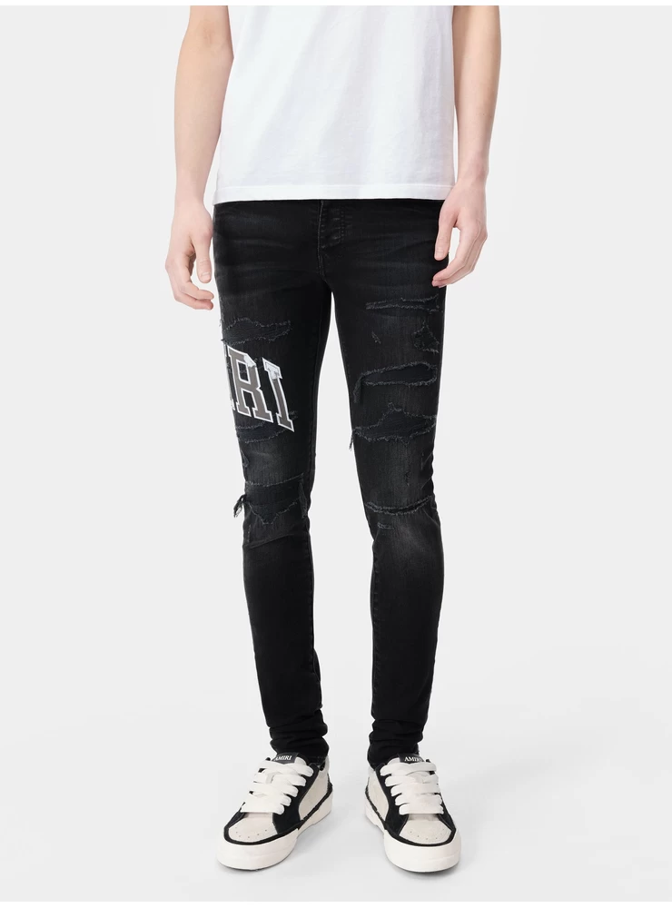 Amiri VARSITY LOGO REPAIR JEAN - Vintage Black