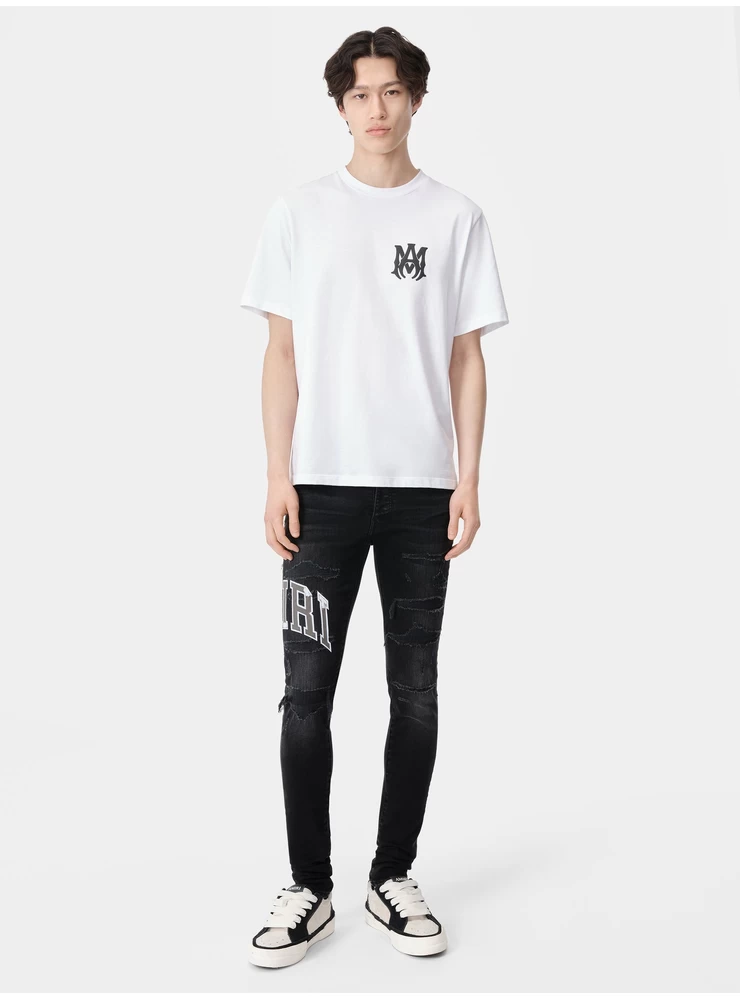 Amiri VARSITY LOGO REPAIR JEAN - Vintage Black
