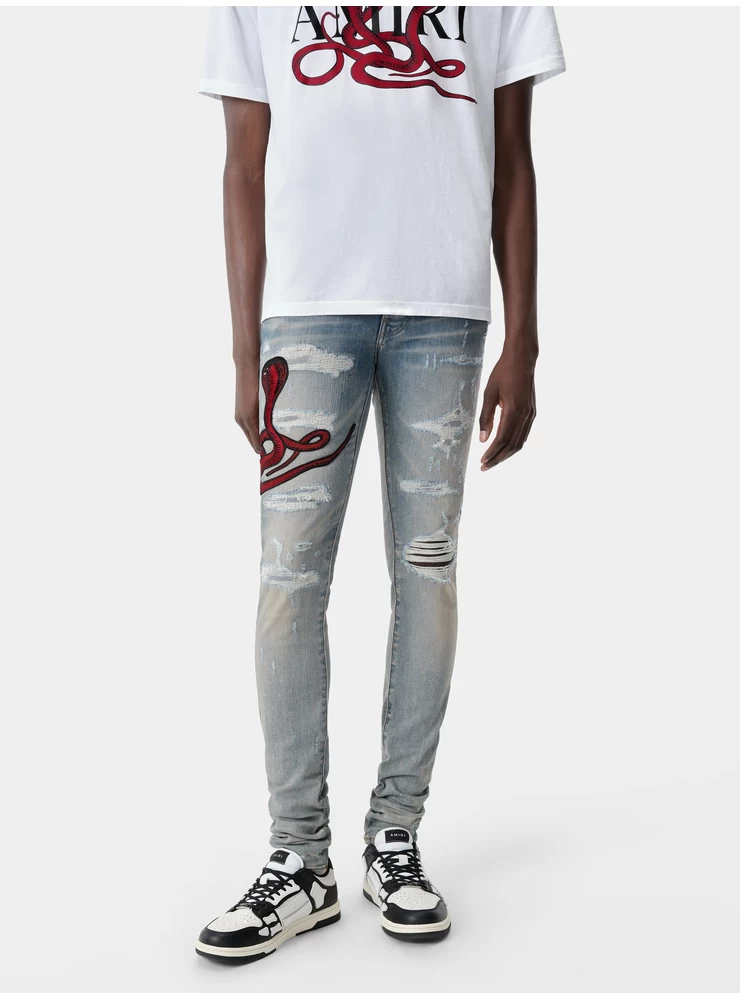 Amiri RED POISON ARCHIVAL JEAN - Clay Indigo