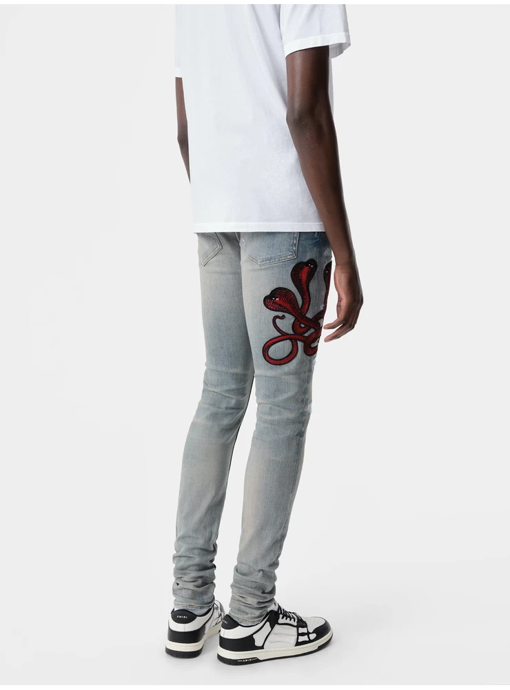 Amiri RED POISON ARCHIVAL JEAN - Clay Indigo