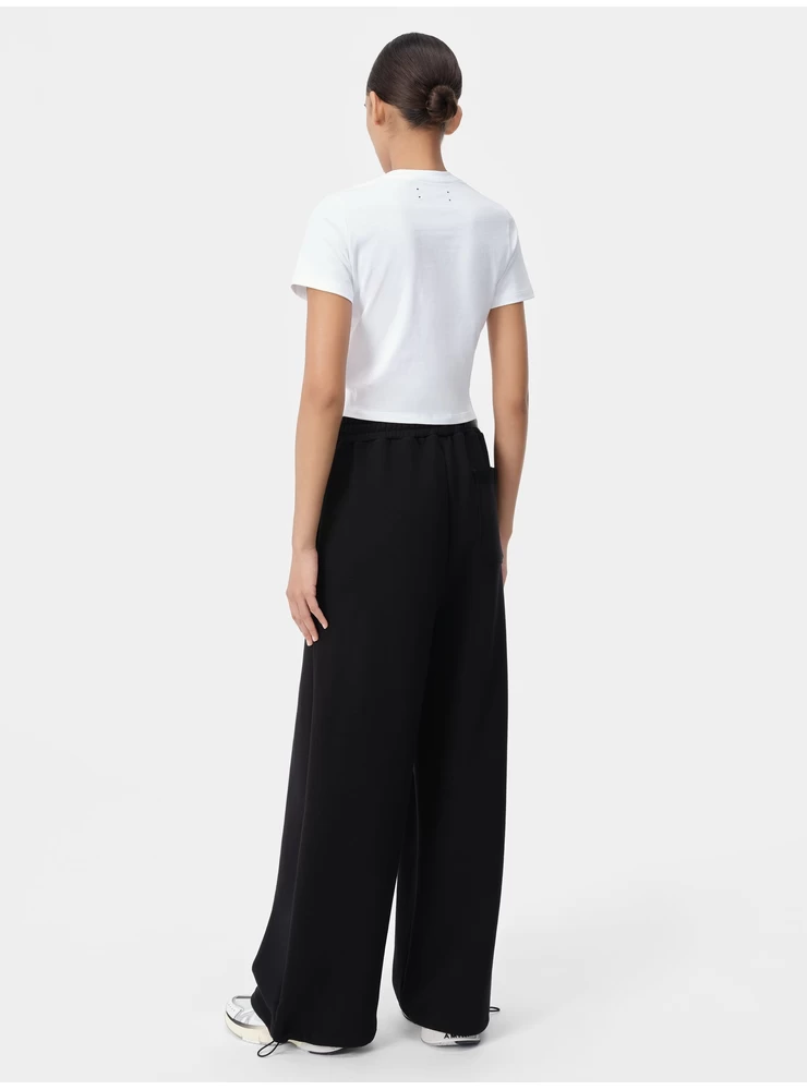 Amiri WOMEN - WOMEN'S ARTS DISTRICT FLARE SWEATPANT - Black